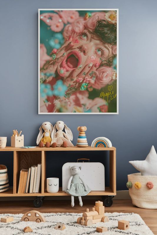 The screaming flowers print hung above a dark wood shelf crowded with dolls, toys and books on a dark wall.