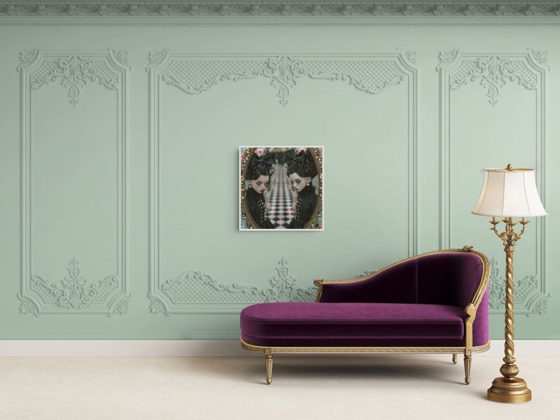 The gothic twin dolls print hung on a mint paneled wall above a purple velvet chaise and a brass lamp.