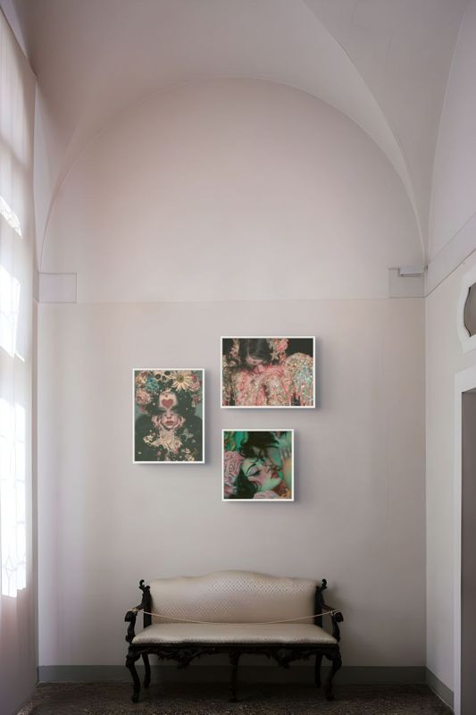 All three I'll Grieve You prints hung together in a white arched hallway above a small bench.