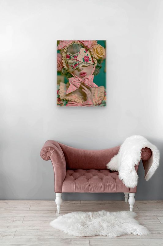 Portrait art print of a surreal blindfolded bow girl on a white wall above a tufted pink velvet chaise lounge with white turned legs and a white faux fur throw on pale wood floors.