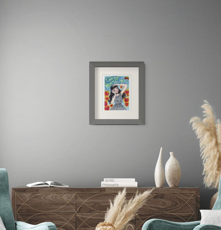 The Investigator framed on a wall