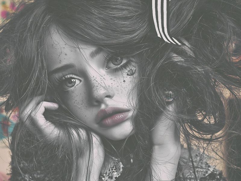 Closer view of the freckled face resting in her hands, wide eyes looking straight out, wild hair and a striped ribbon.